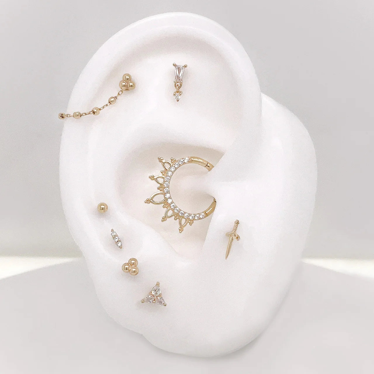 INDRA - CZ - SOLID 14KT GOLD CLICKER piercing-zone.com